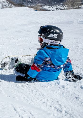 A child snowboarder at Aspen Snowmass