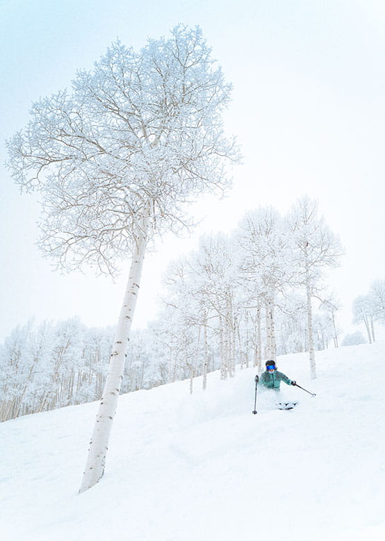 Lone skier enjoys a powder day at Aspen Mountain