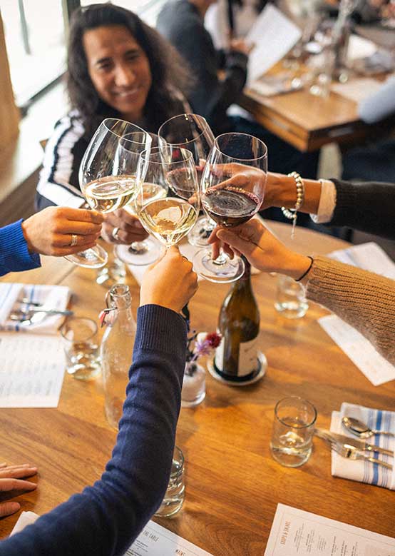 Friends toast at Alpin Room Snowmass