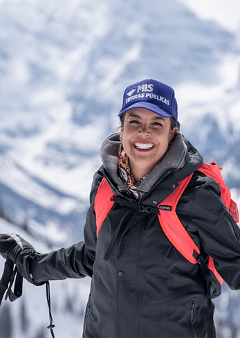Beatriz Soto smiles at the camera after upholding on Aspen Highlands