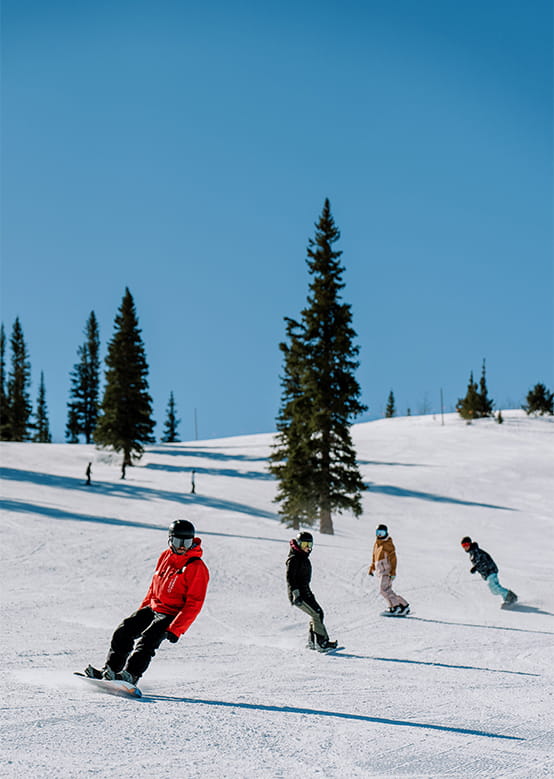 Snowboarding adult lesson at Snowmass