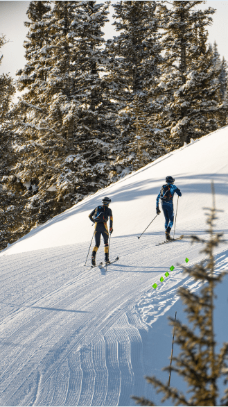 two people compete in the power of four uphill race