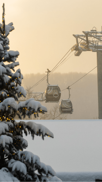 gondolas on aspen mountain at dawn