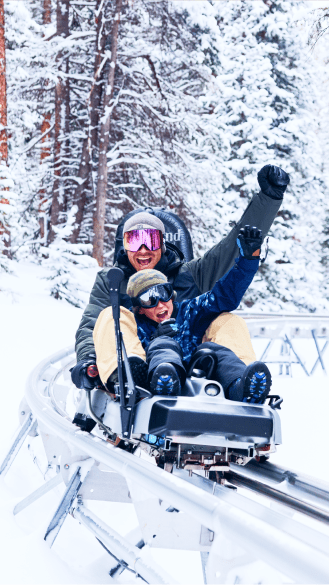 Father and son on alpie coaster at snowmass