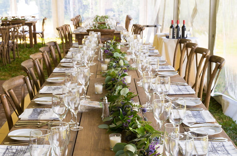 A long table set for a wedding by ASC Catering