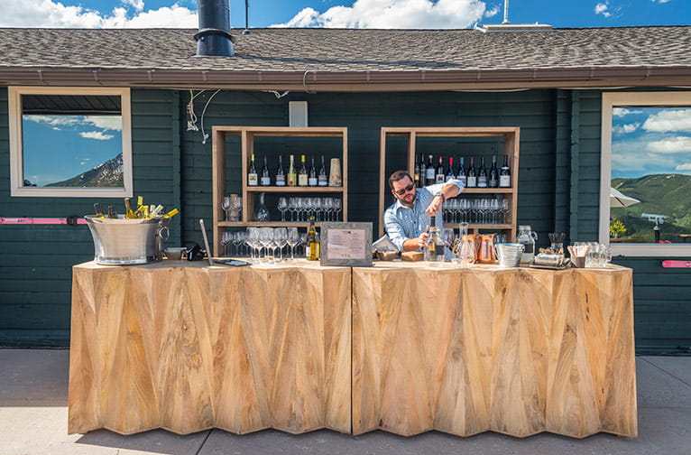 An outdoor bar set up at the Cliffhouse atop Buttermilk