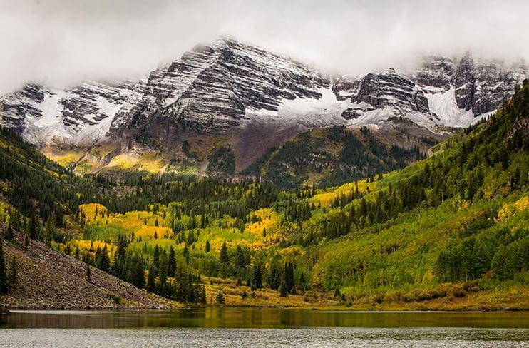 Maroon Bells with the first snow of the year and yellow aspens.