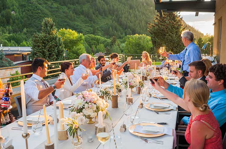 Toasting at a wedding at Limelight Hotel Aspen