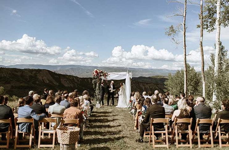 Wedding ceremony scene at Lynn Britt Cabin