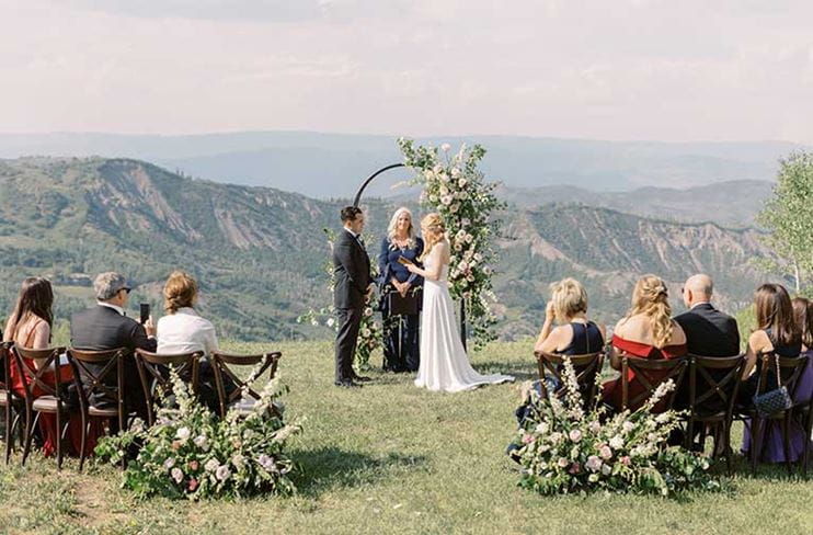 Couple exchanges wedding vows at Snowmass