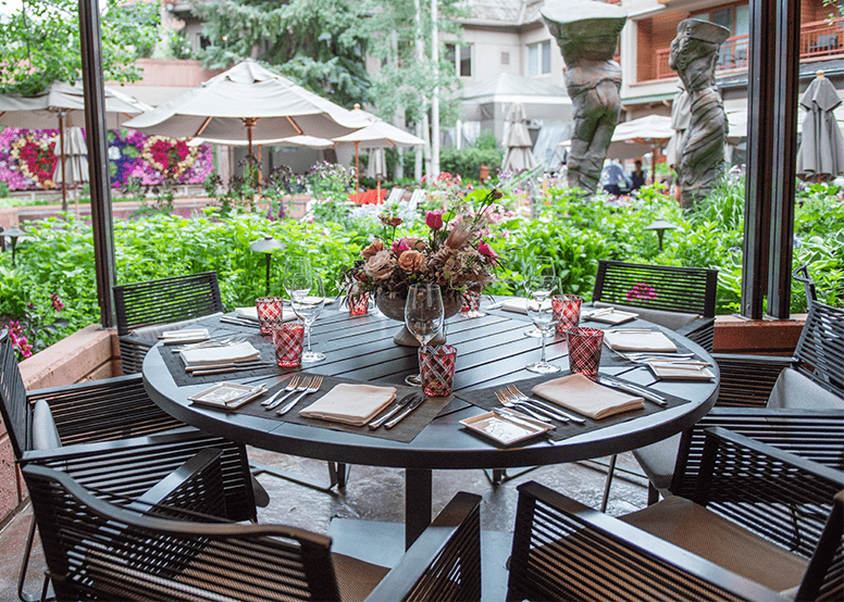 The Little Nell outdoor dining, on a green summer day