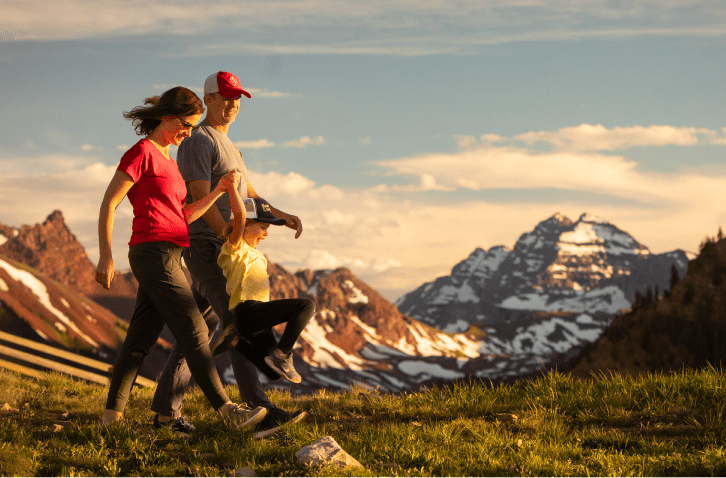 Couple hikes with dogs atop Snowmass 