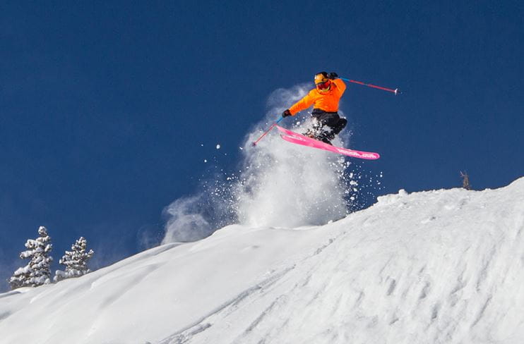 A skier gets air at Aspen Highlands