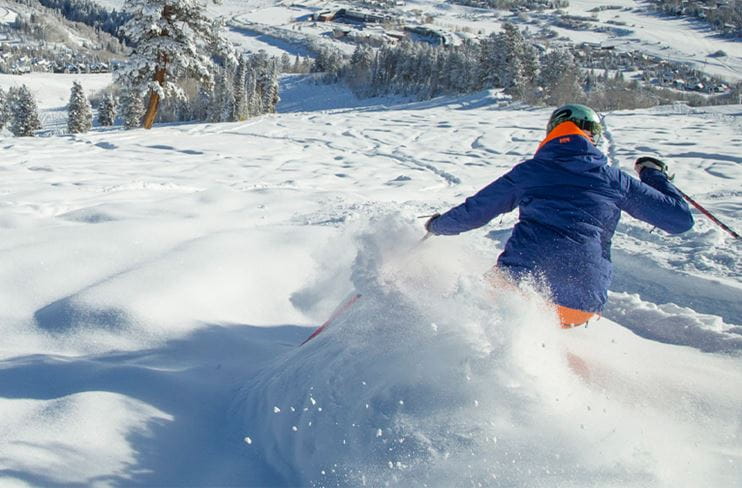 A skier finds powdery turns at Buttermilk