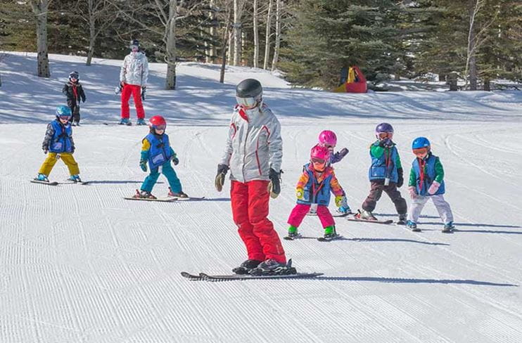 Child group ski lesson at Aspen Snowmass