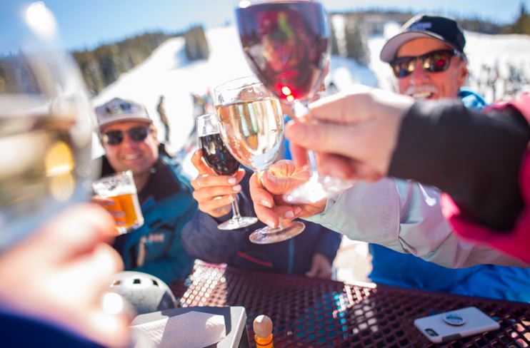 People toasting at Cloud Nine Alpine Bistro