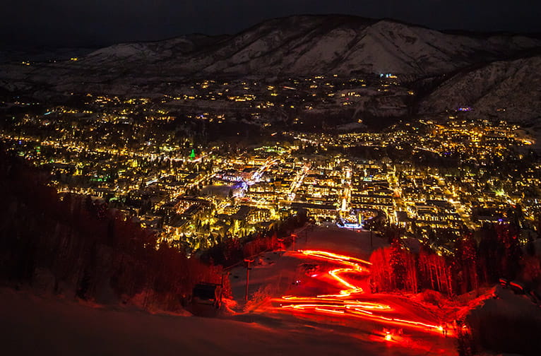 The town of Aspen lit up at night during KickAspen Night Skiing.