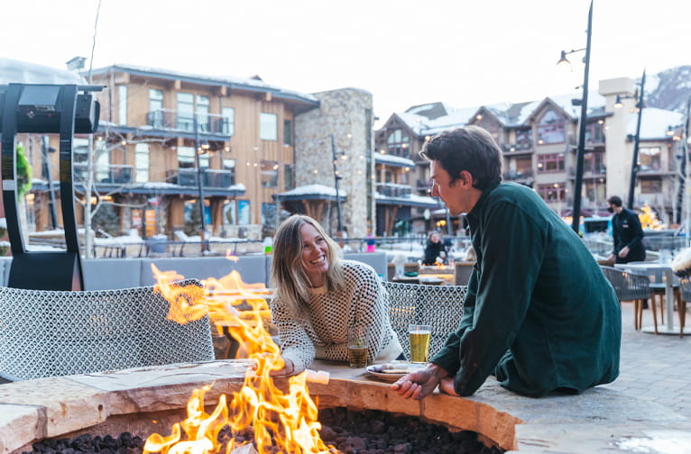 Enjoying the outdoor fireplace at Limelight Hotel Snowmass