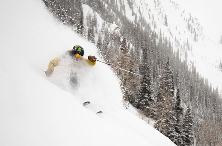 An expert skier tackles extreme terrain at Aspen Highlands