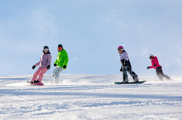 Family of snowboarders at Aspen Snowmass