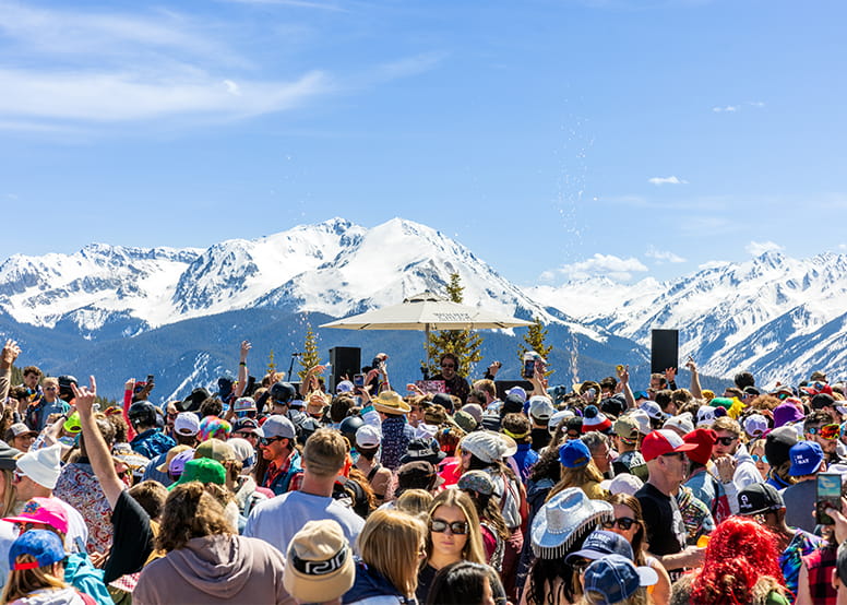 Guests of Aspen Snowmass party on Aspen Mountain's sundeck, during opening day weekend