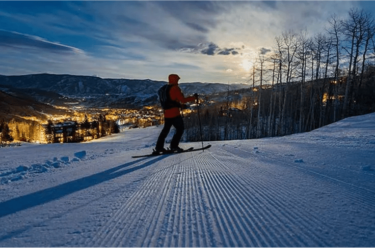 Single person uphills at Buttermilk under the full moon at Buttermilk Dinner