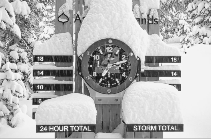 aspen highlands mountain cam with snow stacked atop the stake