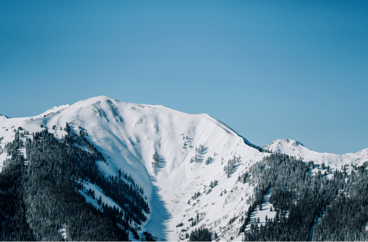 Aspen highlands bowl on a blue bird day in the winter