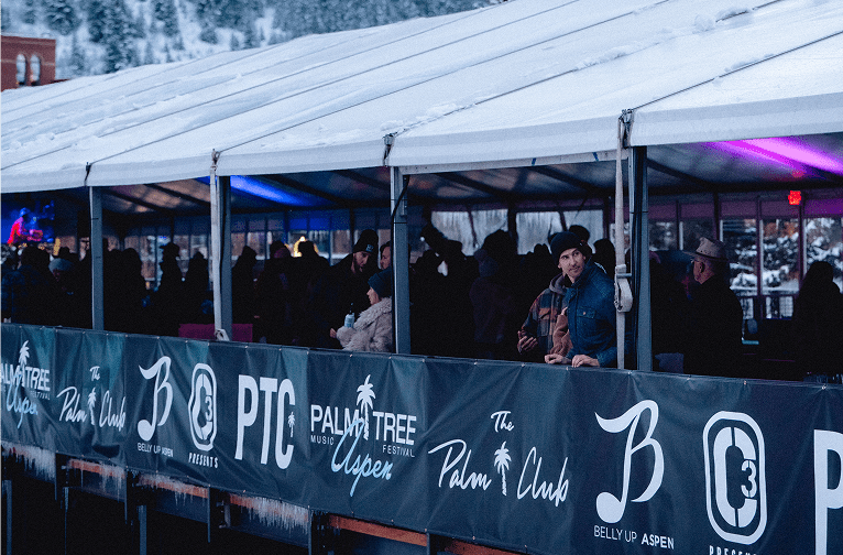 Palm Club tent at palm tree music festival