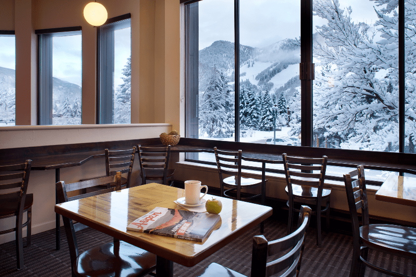 The Hotel Aspen's Great Room features breathtaking views of Aspen Mountain.