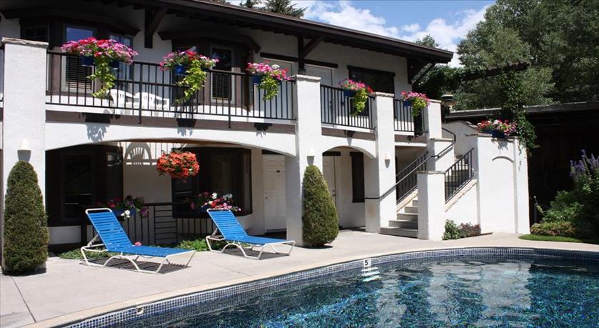 Heated Pool with Room/Kitchenette's in the back ground