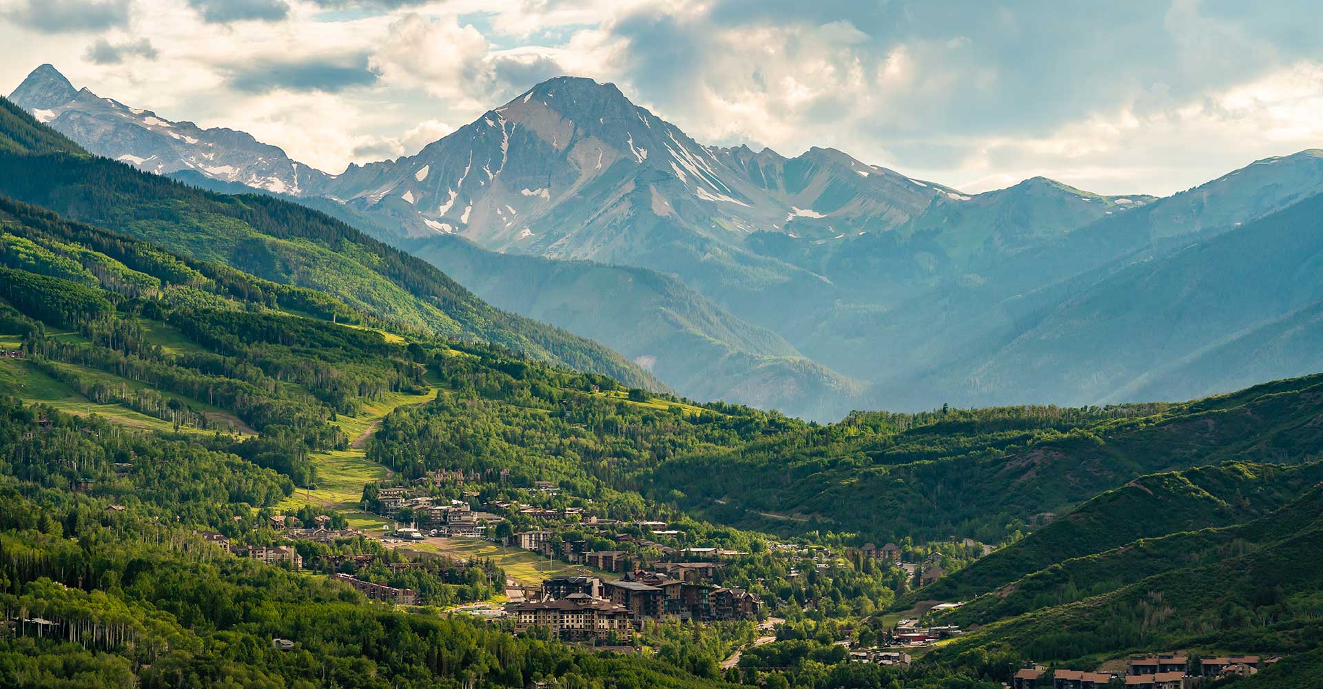 Mount Daly rises over Snowmass Village in summer.