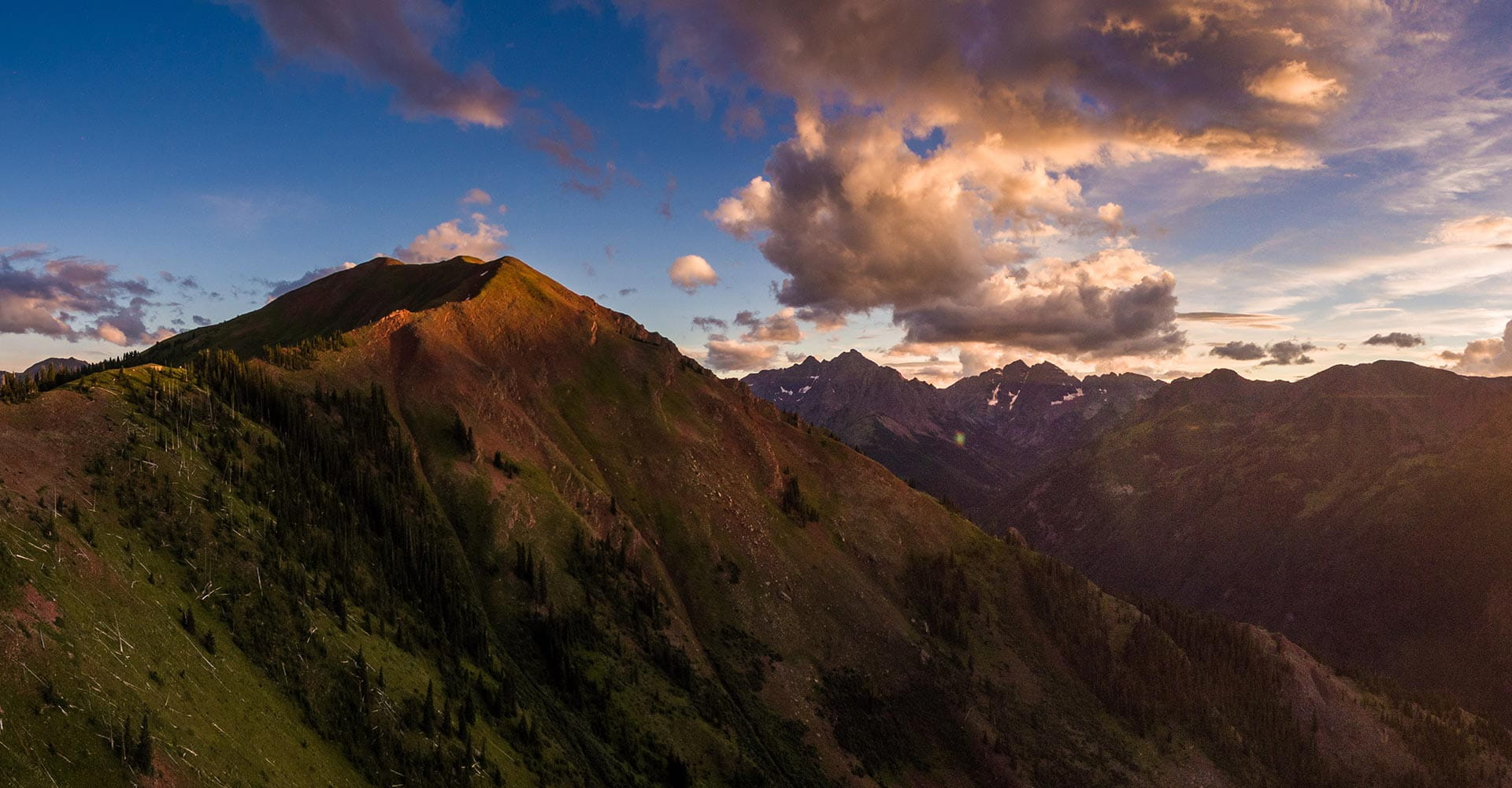 Aspen Highlands and Highland Peak at sunset in summer