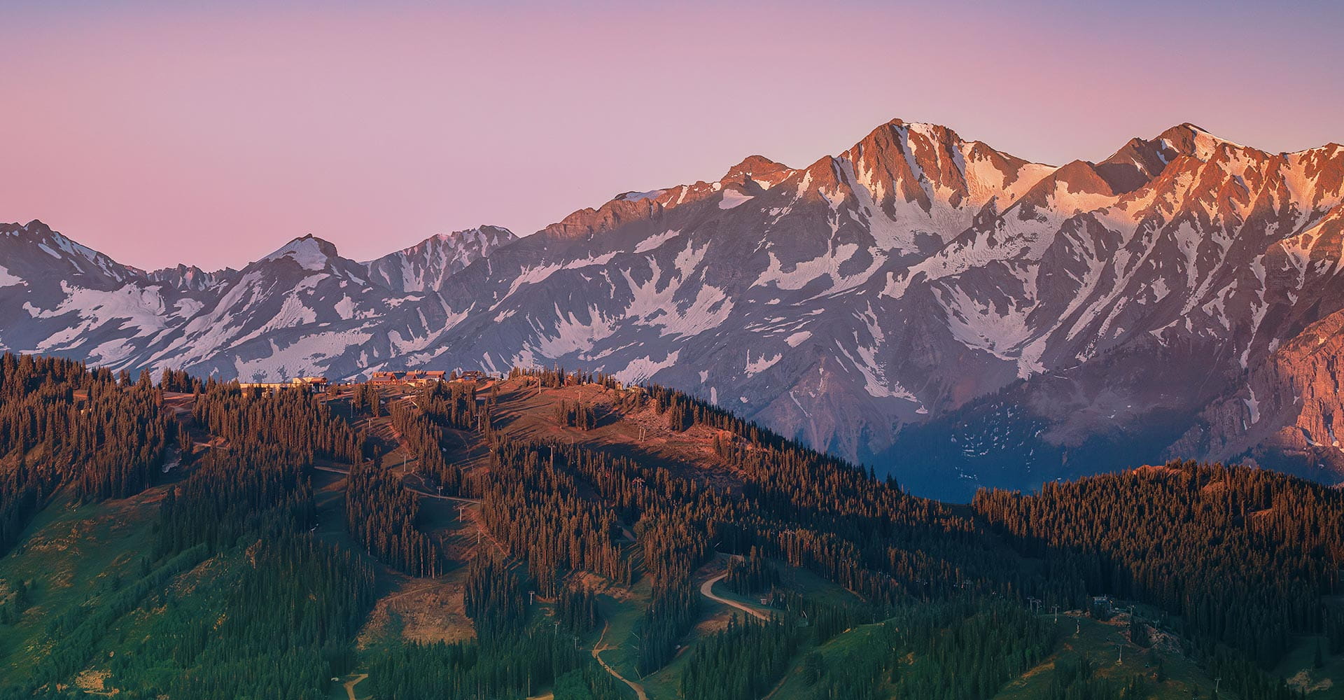 Aspen Mountain with the Elk Mountains at sunrise.