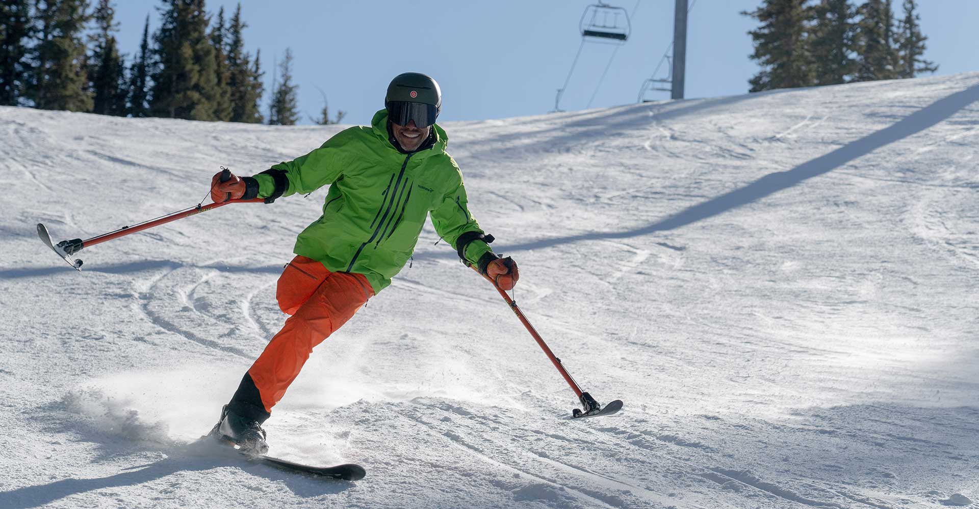 Tony Drees skiing on a bluebird day