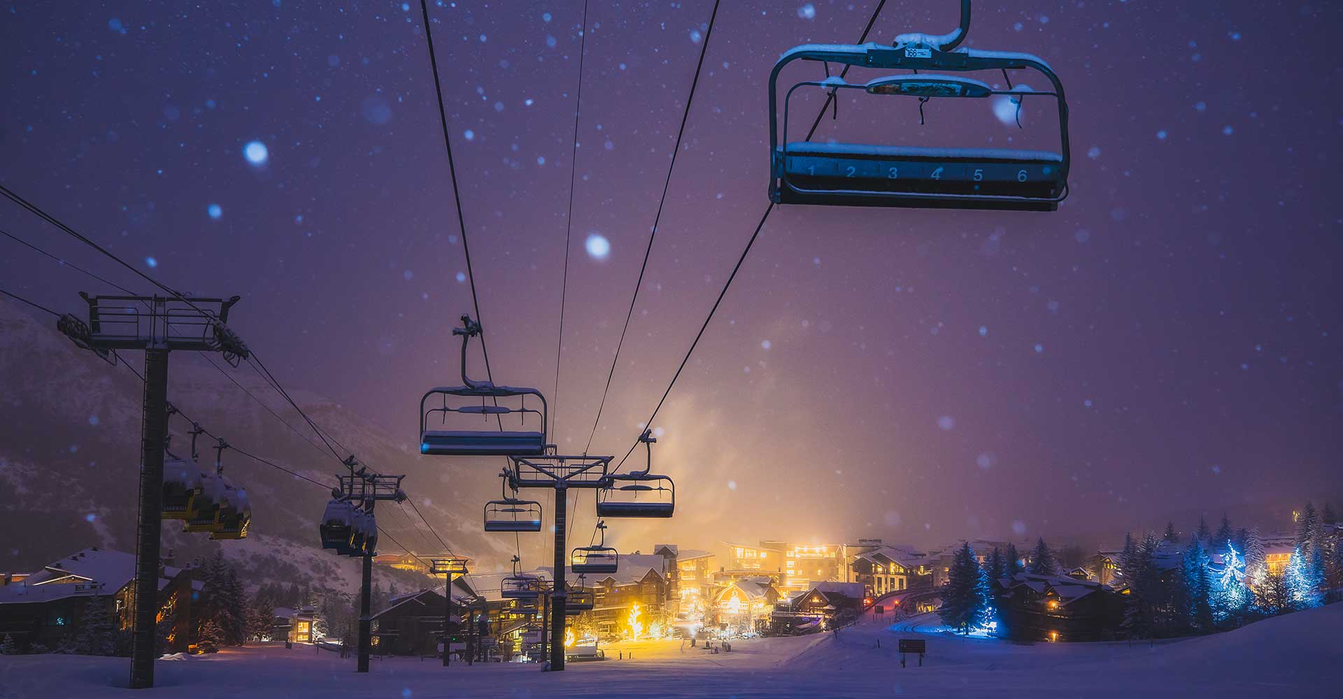 Closed lifts at night in a snowstorm at Aspen Snowmass