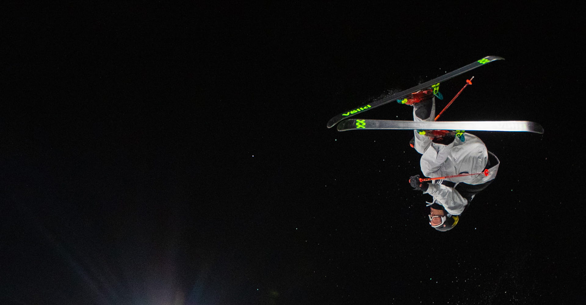 Halfpipe skier doing an aerial trick at X Games Aspen