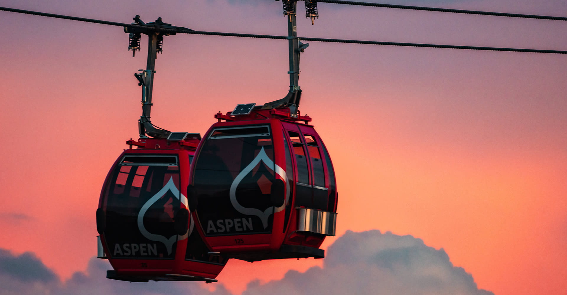 Two Silver Queen Gondolas at sunset