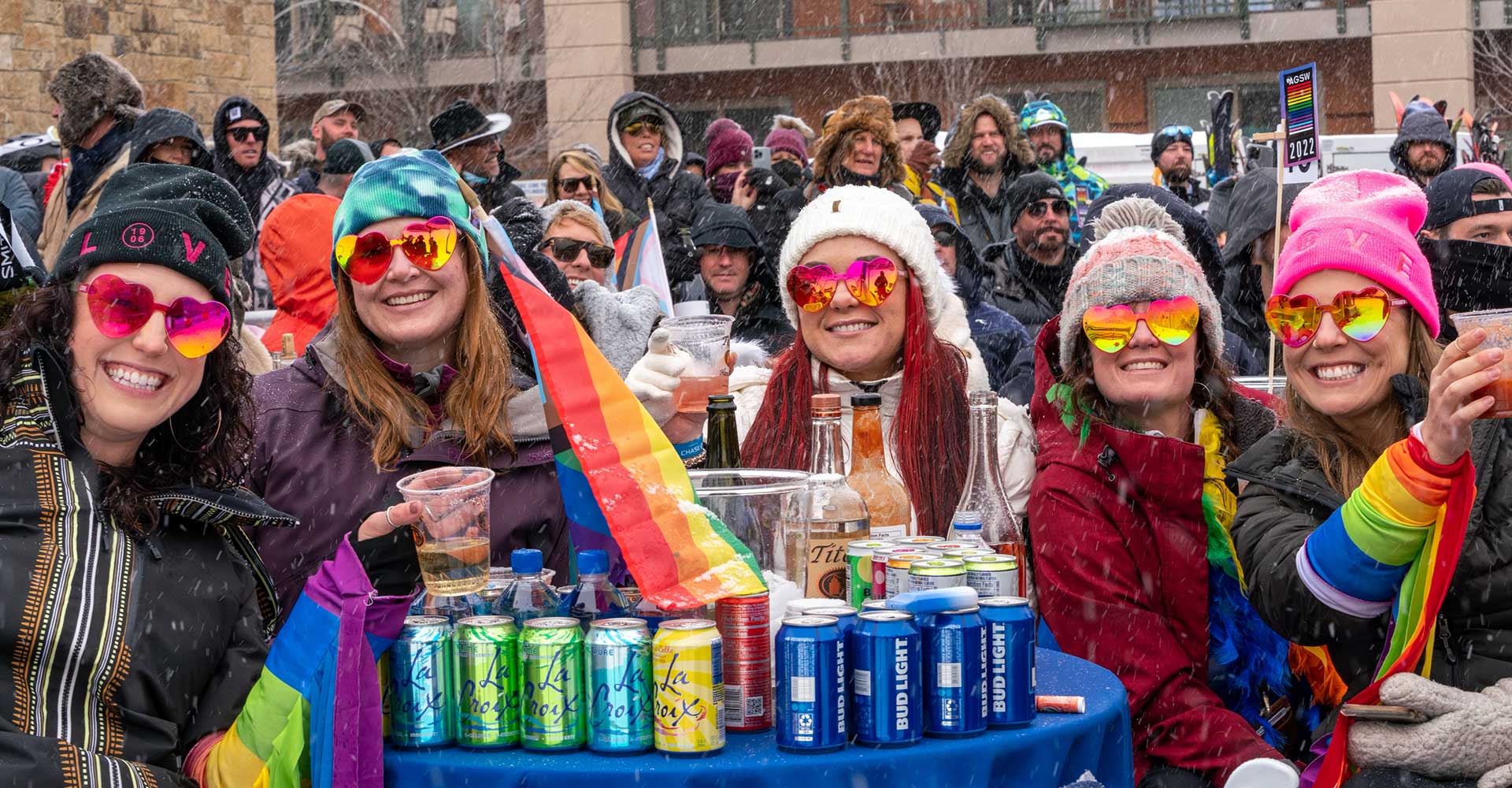 Women celebrate Aspen Gay Ski Week at the base of Aspen Mountain in 2022
