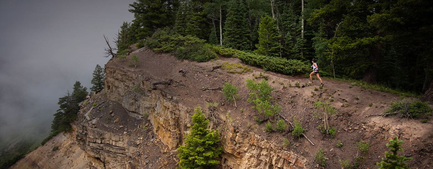 Runner competing in the Audi Power of Four trail race in Aspen Colorado.