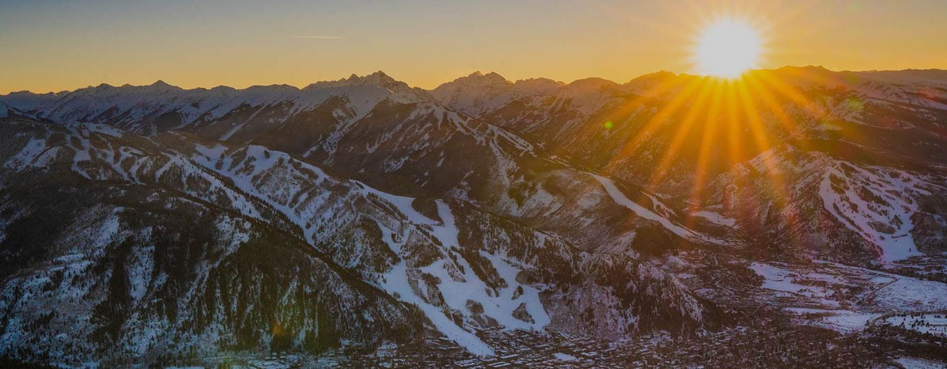 Sun setting over Aspen Colorado on a perfect winter evening.