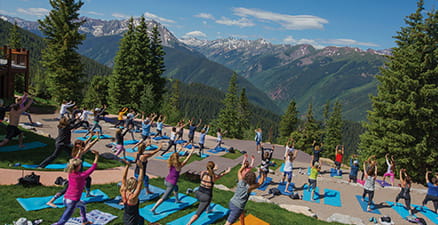 Mountaintop yoga at Aspen Mountain in Aspen Colorado
